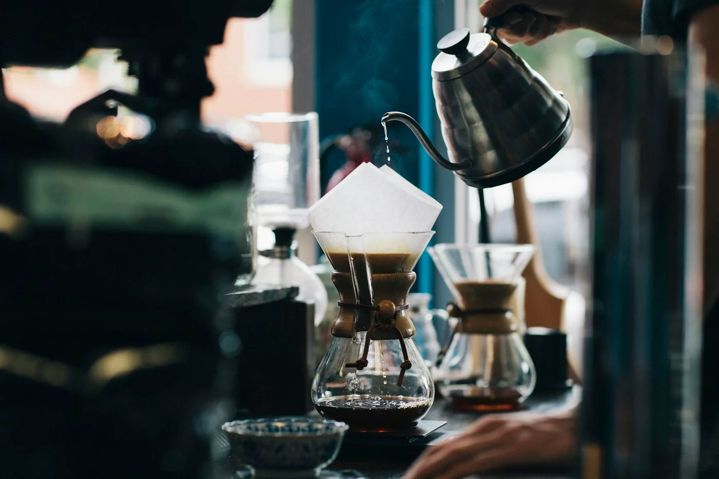 Coffee being poured in a café